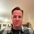 Greg K.