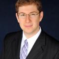 Adam A.