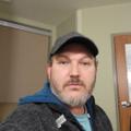 Jonathan K W.