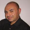 CARLOS L.