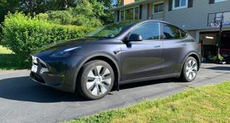 Tesla Model Y 2024 — Options de location de voitures à Lake Echo, NS