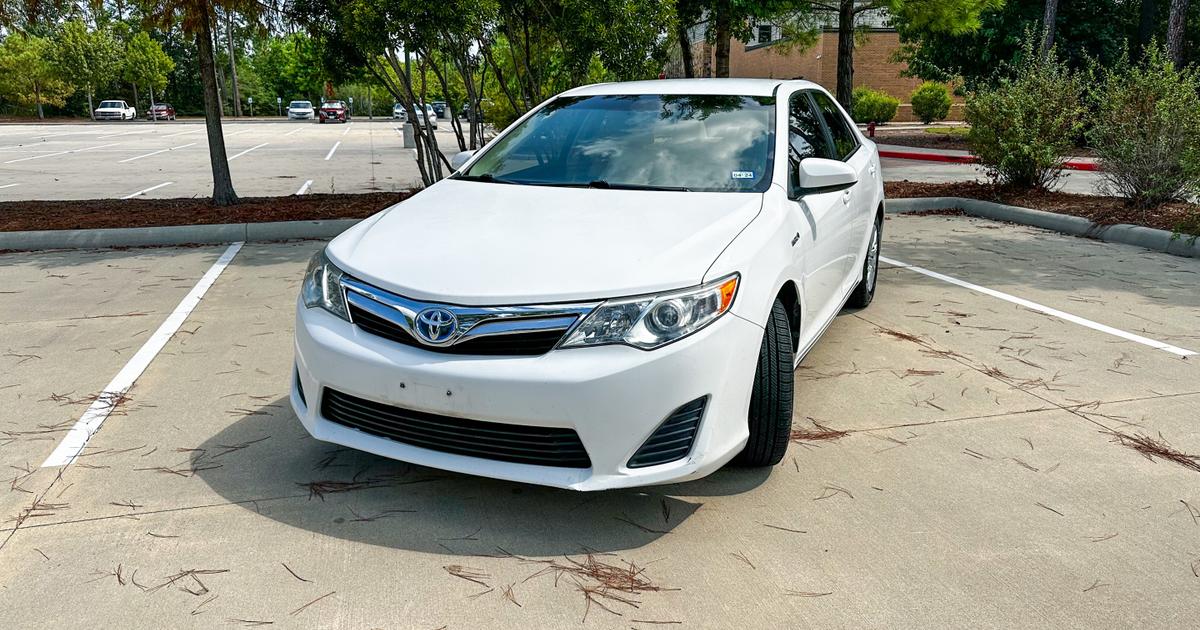 Toyota Camry Hybrid 2012 rental in Houston, TX by Hobby Car Rentals