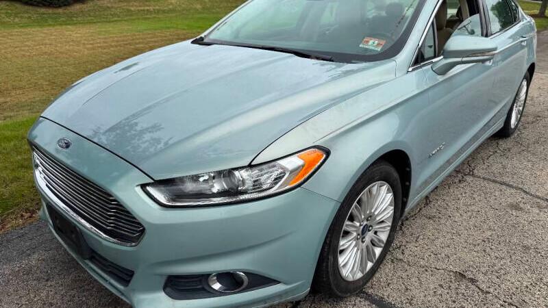 Ford Fusion Hybrid 2013 rental in Romeoville, IL by HopeifyHub LLC  . | Turo